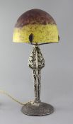 A French Art Deco silvered metal and glass mushroom table lamp, in the manner of Edgar Brandt, the