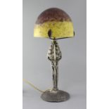 A French Art Deco silvered metal and glass mushroom table lamp, in the manner of Edgar Brandt, the