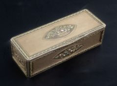 An early 19th century French three colour gold rectangular snuff box, each finely reeded panel