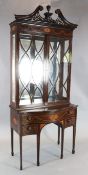 An Edwardian Sheraton Revival marquetry inlaid mahogany bookcase, with swans neck cornice, two