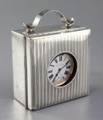 A plated Goliath pocket watch by J C Vickery, in silver mounted square case with strap handle and