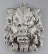 An 18th century 'Green Man' lead fountain head, 15 x 12in.