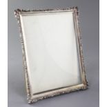 An early 20th century silver mounted photograph frame by Asprey & Co Ltd, London, 1912?, 9.25in.