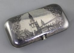 A 19th century Russian silver and niello work cheroot case, decorated with the Kremlin Spasskaya