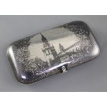 A 19th century Russian silver and niello work cheroot case, decorated with the Kremlin Spasskaya