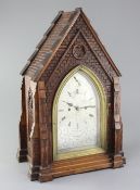 Carrew & Rule, Fenchurch Street, London. A Victorian Gothic design oak hour repeating bracket clock,