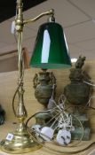 A brass student's lamp and two onyx lamps