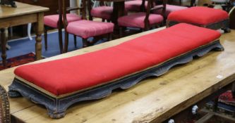 A Victorian ebonised fender stool and a Victorian footstool W.134cm, W.44cm