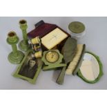 An Art Deco green bakelite dressing set, a bible and opera glasses