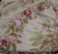 A large Aubusson style needlepoint carpet, decorated with roses