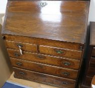 A mid 18th century oak bureau, W.91cm