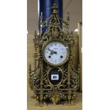 A brass mantel clock