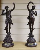 A pair of bronzed spelter figures