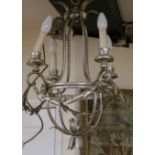 A pair of silvered modern light fittings