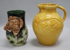 A Susie Cooper signed 'leaping gazelle jug', incised mark and a French art pottery vase