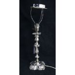 An Edwardian silver candlestick by William Hutton & Sons,now converted to a lamp, London, 1906, 30cm