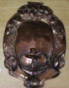 An Arts & Crafts copper wall sconce