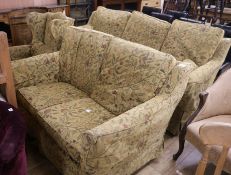 A three piece lounge suite comprising three seater settee, two seater settee and wing armchair