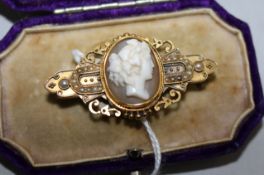 A Victorian gold, cameo and seed pearl brooch, 44mm.