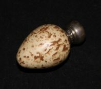 A late Victorian silver mounted porcelain egg-shaped scent bottle and stopper by Saunders &