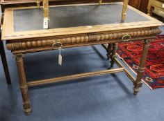 A French walnut writing table, W.120cm