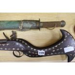 An inlaid musket and an Eastern sword