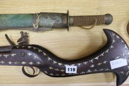 An inlaid musket and an Eastern sword