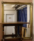 A modern gilt frame wall mirror, W.107cm H.130cm