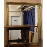 A modern gilt frame wall mirror, W.107cm H.130cm