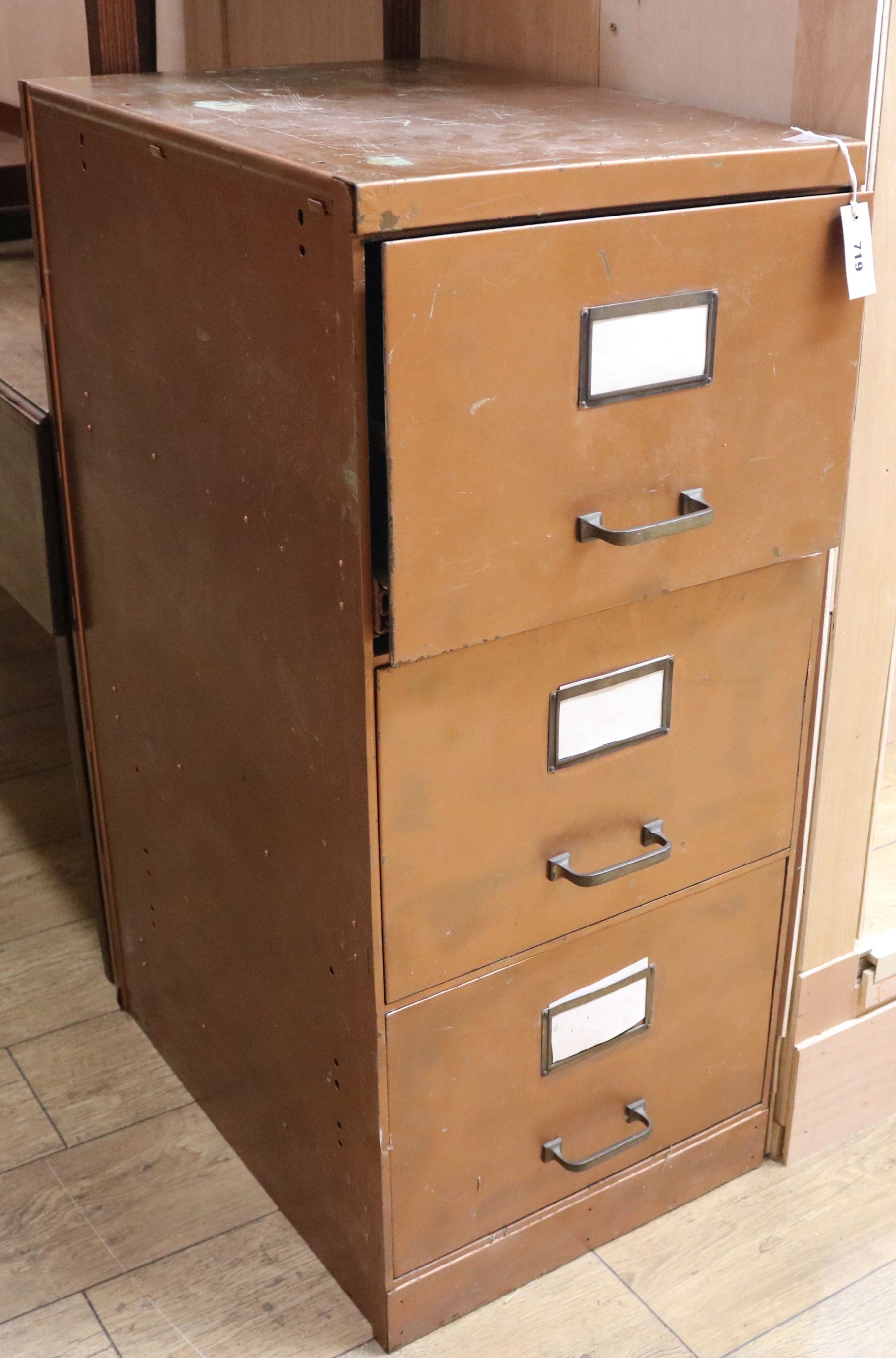 A painted metal three drawer filing cabinet, W.44cm