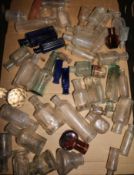 A collection of glass medicine bottles