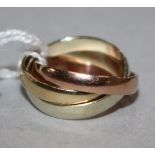 A 9ct three colour gold triple "Russian" wedding ring, size E.
