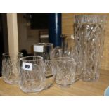 A group of Waterford crystal - three jugs, two mugs, a bowl and a vase