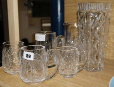 A group of Waterford crystal - three jugs, two mugs, a bowl and a vase