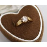 A 9ct gold and cubic zirconia ring.
