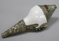 A Tibetan silver mounted conch shell