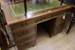 A reproduction mahogany pedestal desk, W.122cm