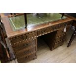 A reproduction mahogany pedestal desk, W.122cm