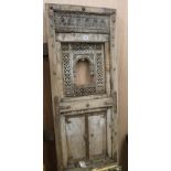 An Indian hardwood door, a gilt gesso picture frame and a curtain pole, door W.50cm H.177