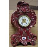 A Victorian ceramic cased eight day mantel clock