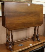 An Edwardian walnut Sutherland table, W.70cm