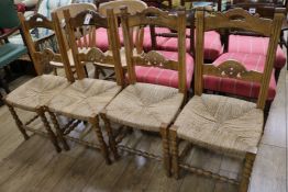 A set of four French provincial fruitwood chairs with string seats and two other chairs (6)