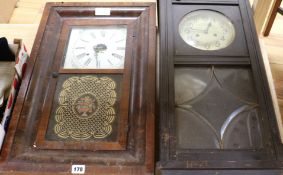 A late 19th century American mahogany wall clock and a 1930's oak wall clock (2)