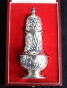 A cased 1970's silver sugar caster.