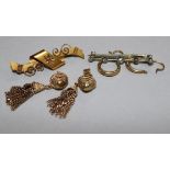 A white metal and diamond bar brooch, a 15ct gold bar brooch and two pairs of 9ct gold earrings.