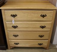 A golden oak chest of four drawers, W.91cm