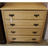 A golden oak chest of four drawers, W.91cm