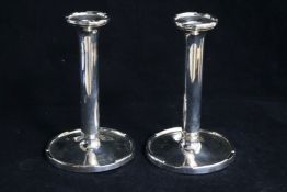 A pair of silver candlesticks, Munsy & Co Ltd, Birmingham, 1936, 18cm.