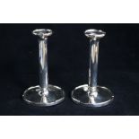 A pair of silver candlesticks, Munsy & Co Ltd, Birmingham, 1936, 18cm.