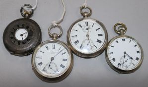 Three silver pocket watches and one other pocket watch.
